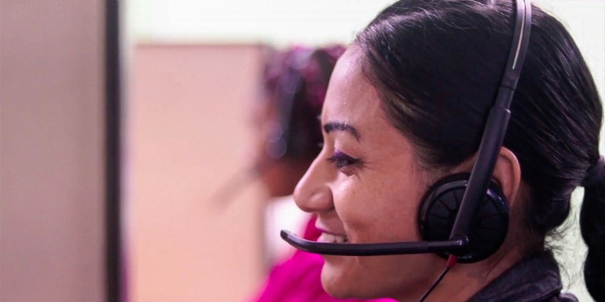 Close-up of a woman wearing a headset.